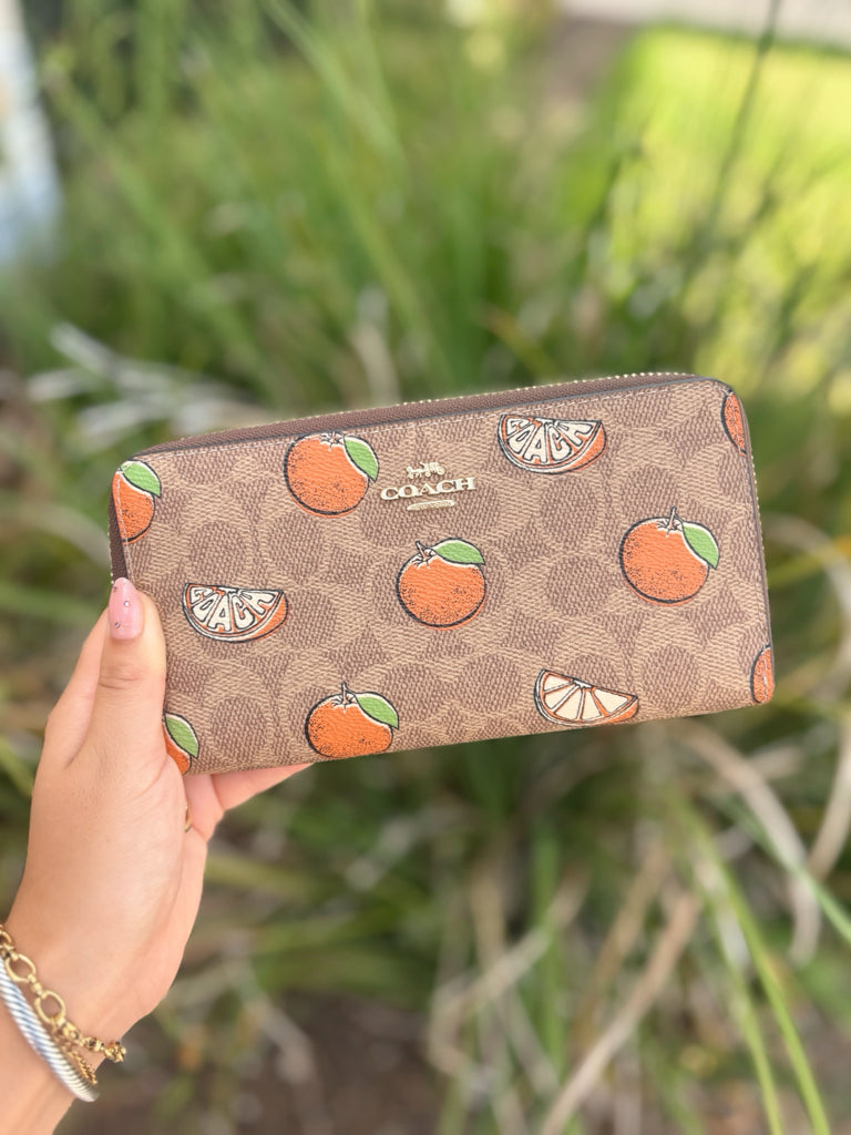 Coach Monogramed  Orange Zippy Wallet
